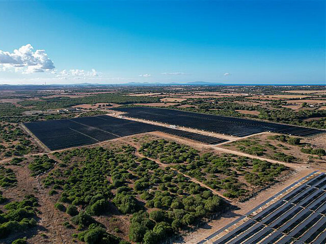 Project site on Sardina with blue sky and sun