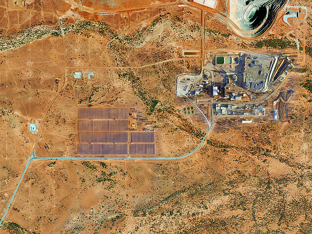 View of the DeGrussa mine, at the edge of the production facility stretches a large photovoltaic system that supplies the mine with independent power.
