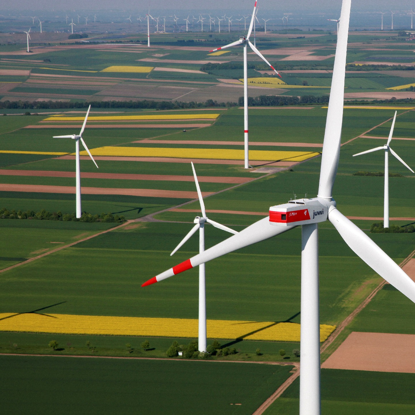 A wind turbine in Flomborn. The new turbines tower above the old ones.